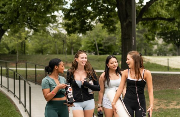 Friends walking to the gym on the Virginia Tech campus