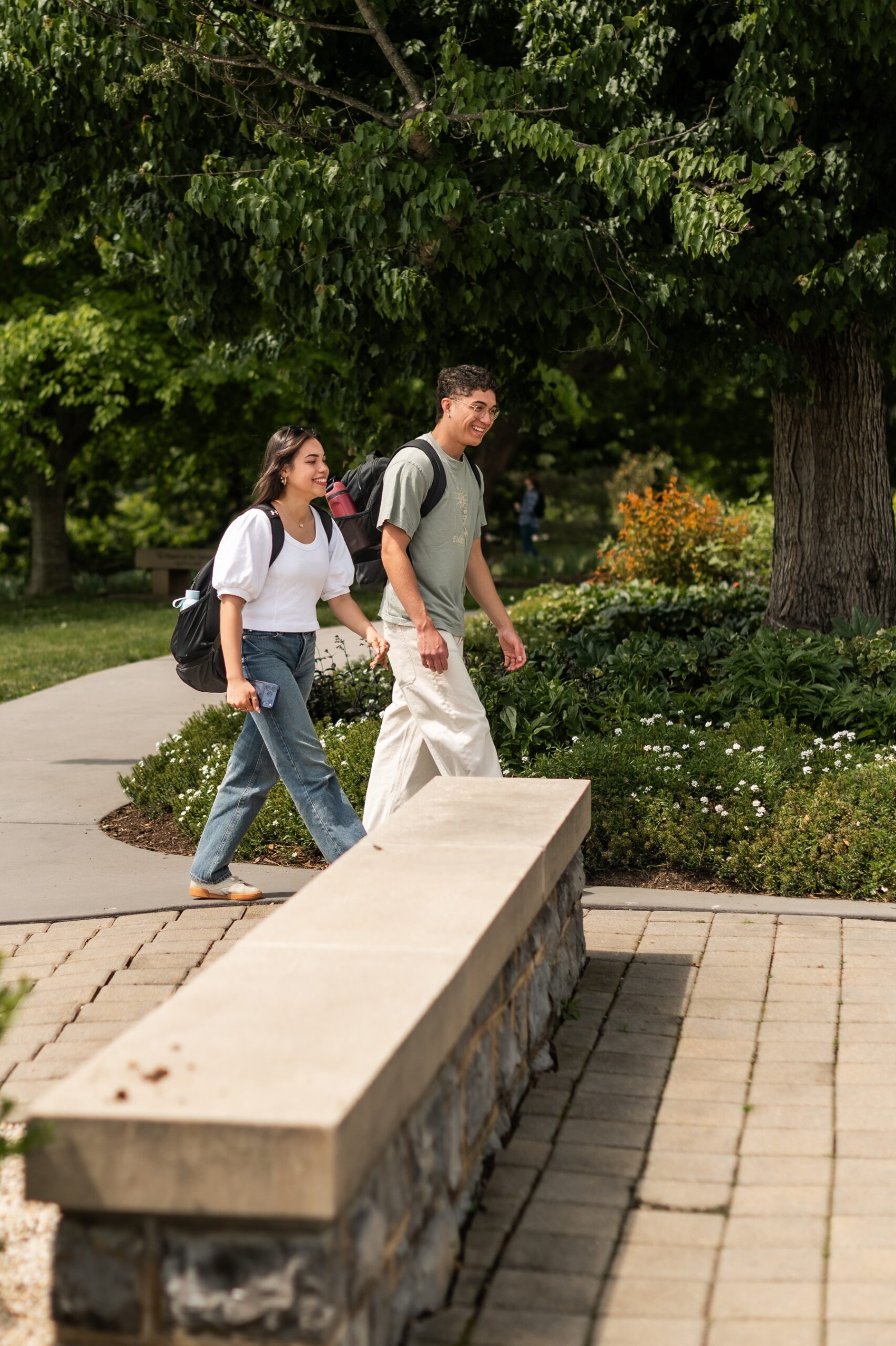 Girl and boy walking to class at Virginia Tech scaled