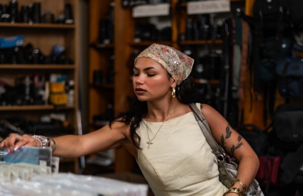 Young woman shopping vinyl records at a boutique in Blacksburg Virginia